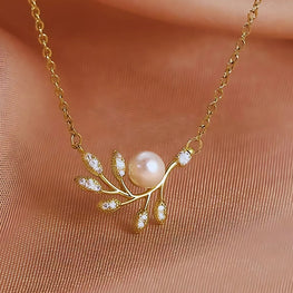 18k Gold Micro Plated 100% Pure Stainless Steel Leaf with Pearl and Zircon Stones – Enchanted Leaf Elegance