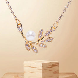 18k Gold Micro Plated 100% Pure Stainless Steel Leaf with Pearl and Zircon Stones – Enchanted Leaf Elegance